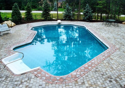 20' x 40' Mexico with paver decking by Blue Dolphin Pools & Spas
