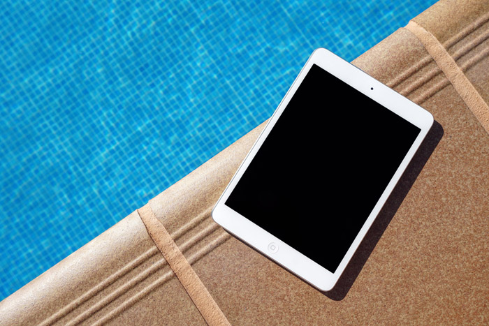 iPad near a pool